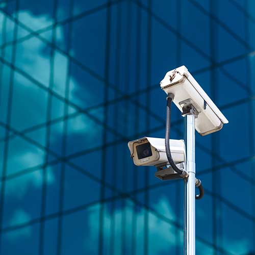 Commercial security camera mounted for property monitoring