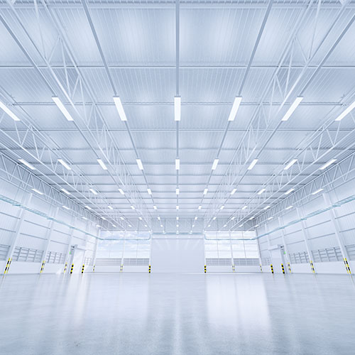 Industrial lighting fixtures across a large facility